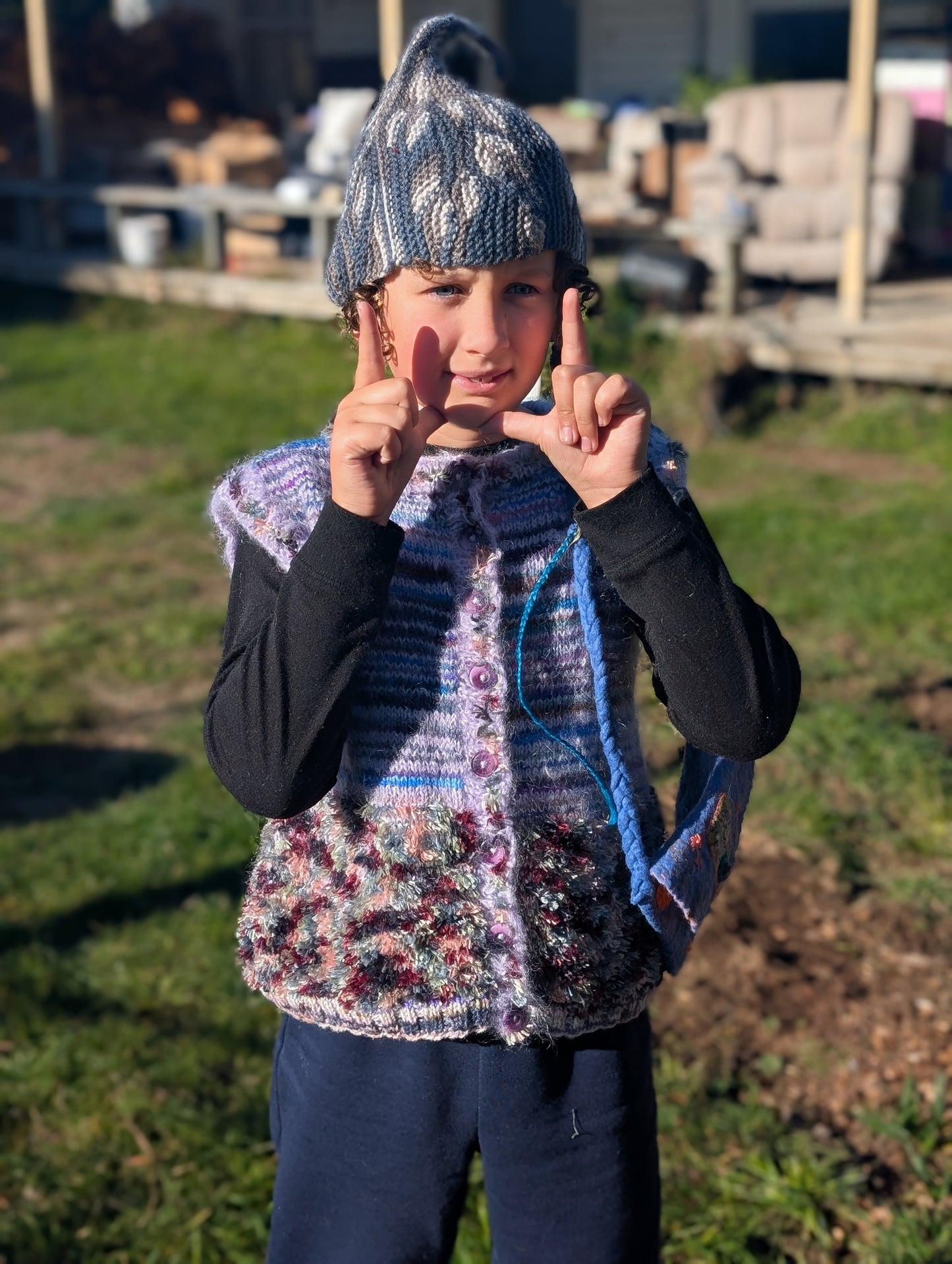 Hand-Knitted Children's Vest $65