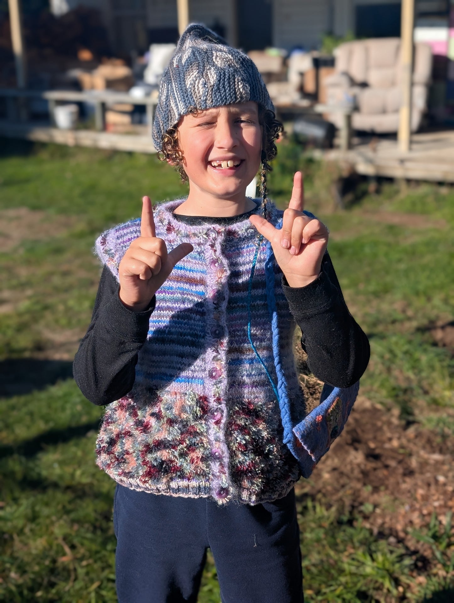 Hand-Knitted Children's Vest $65